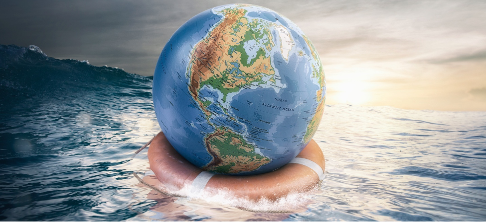 A globe floating on top of an ocean.