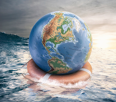A globe floating on top of an ocean.