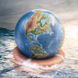 Save the earth concept globe sailing with life buoy in the blue sea